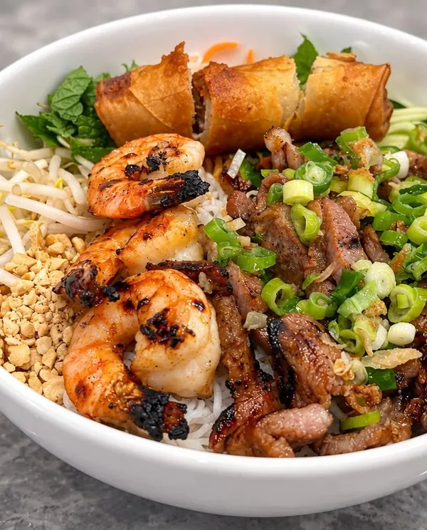 Grilled pork and shrimp over jasmine rice